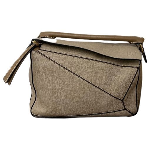 Puzzle leather handbag