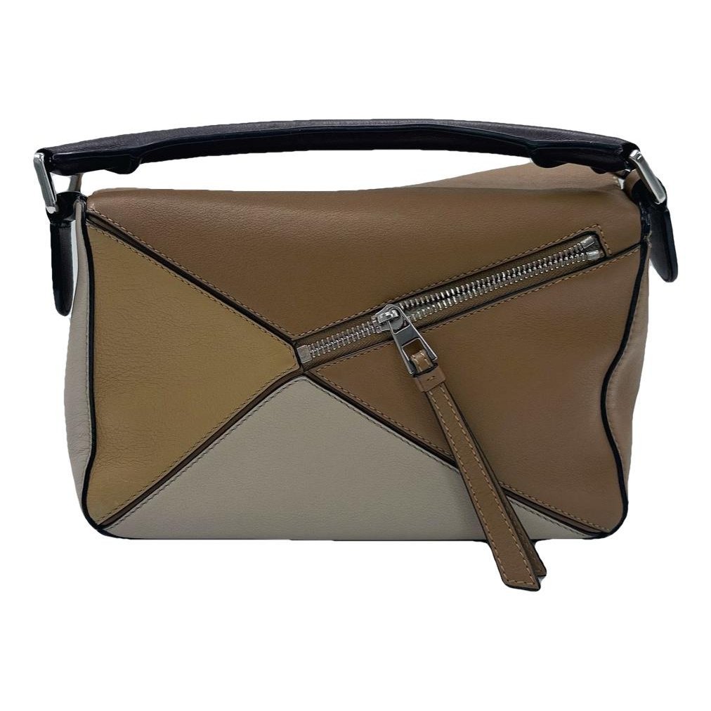 Puzzle leather handbag