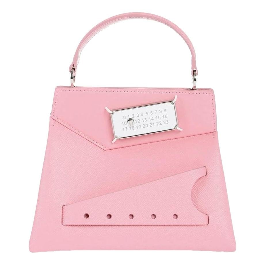Snatched leather handbag