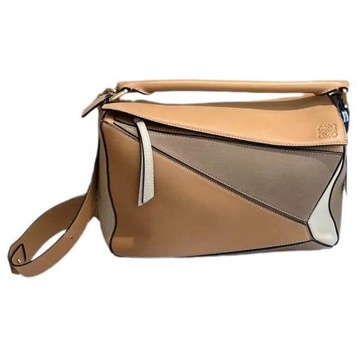 Puzzle leather crossbody bag