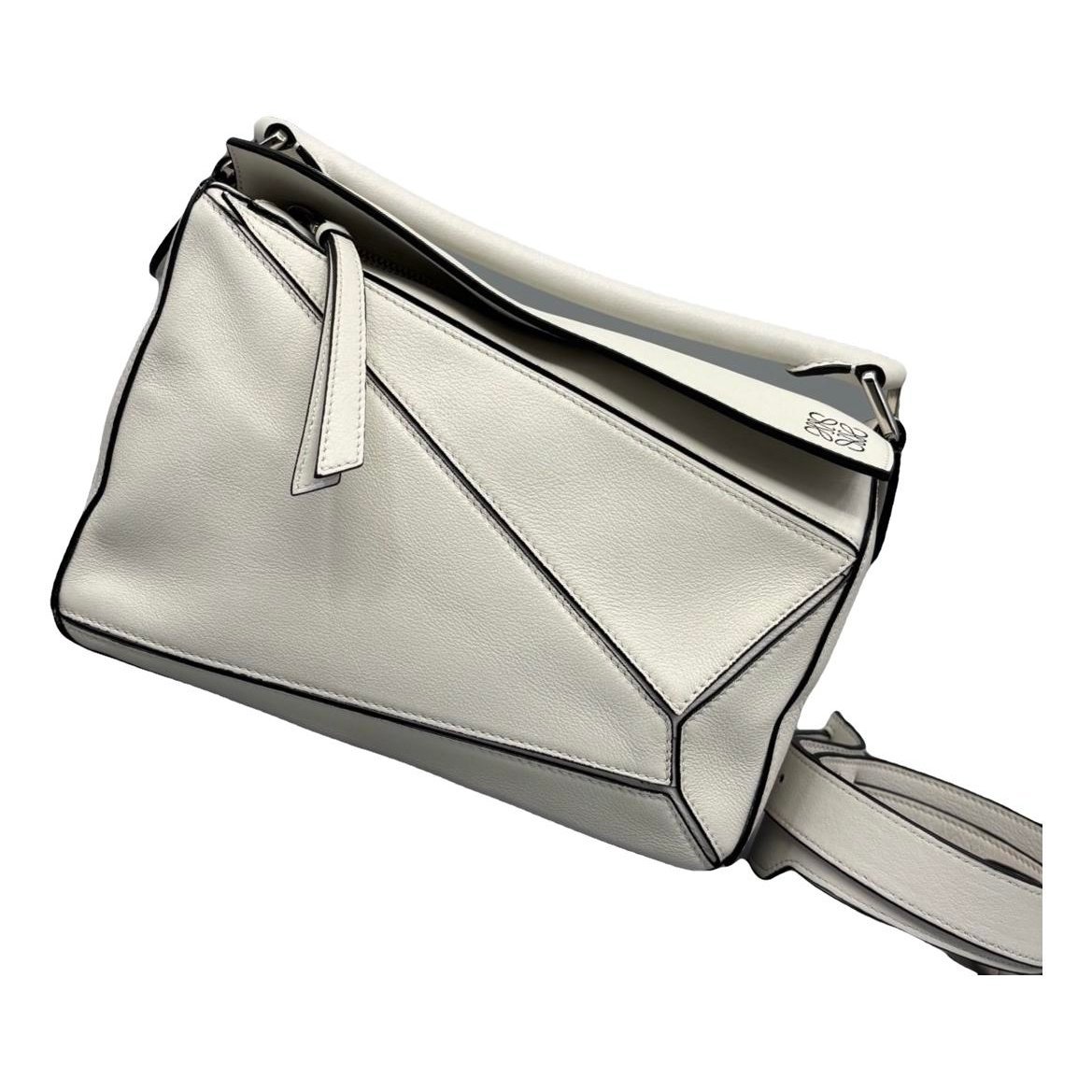 Puzzle leather handbag
