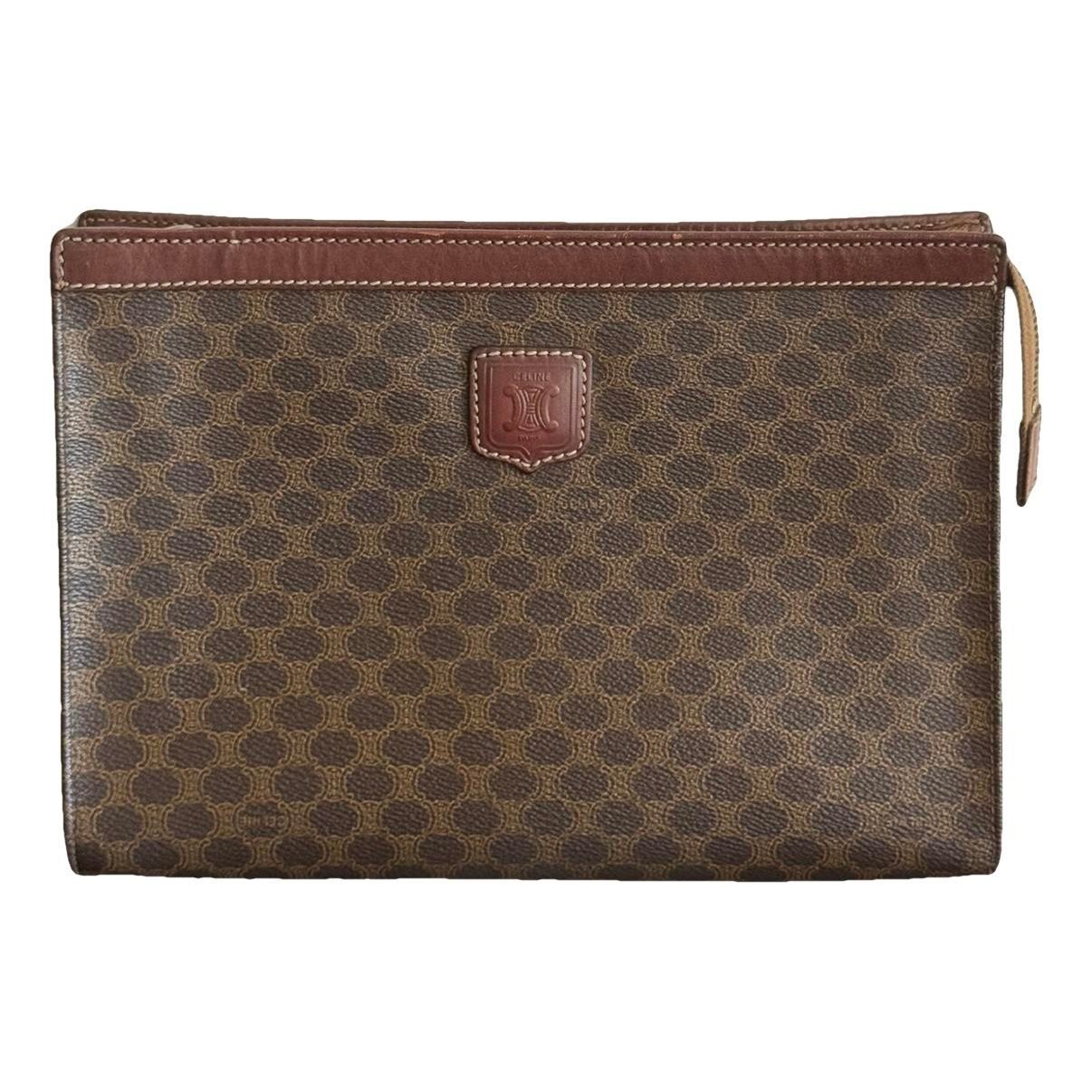 Triomphe Vintage leather clutch bag