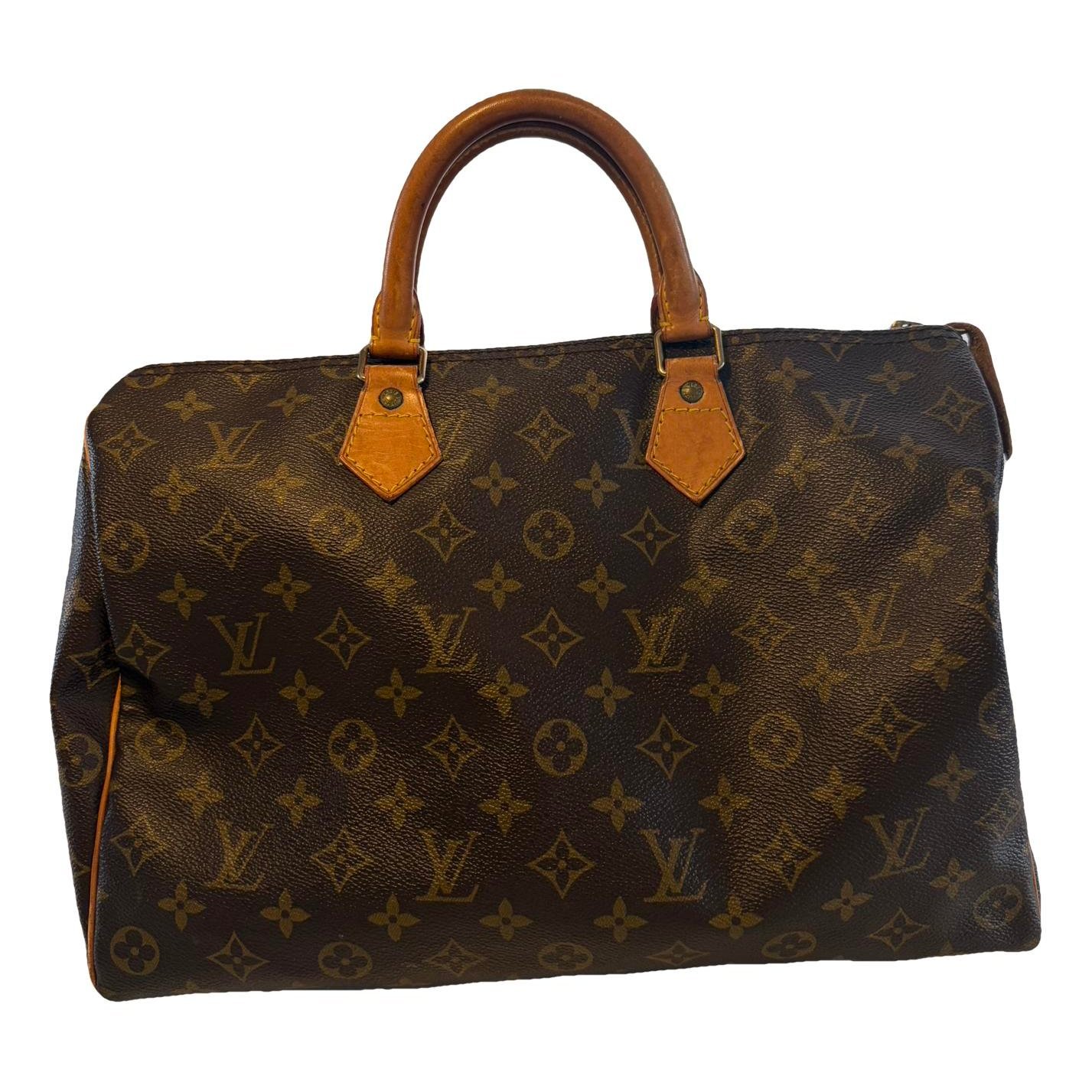Louis Vuitton Speedy linen handbag