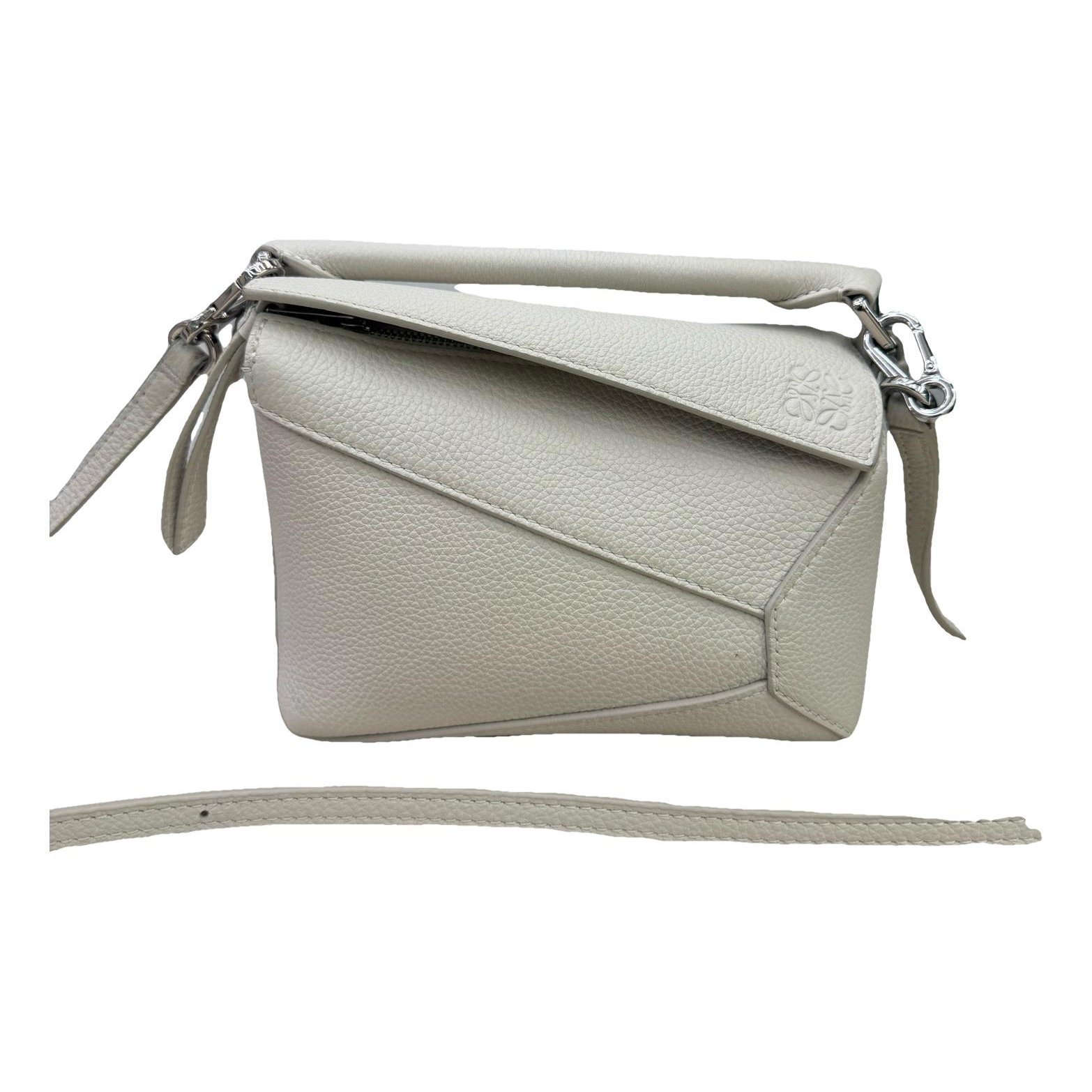Puzzle leather handbag