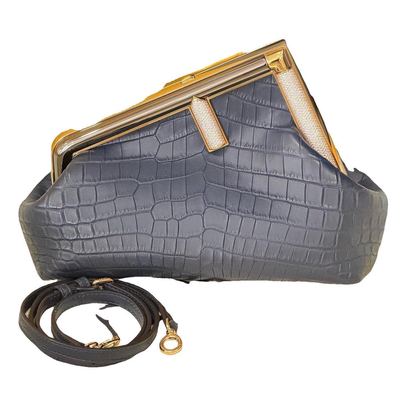 First leather handbag