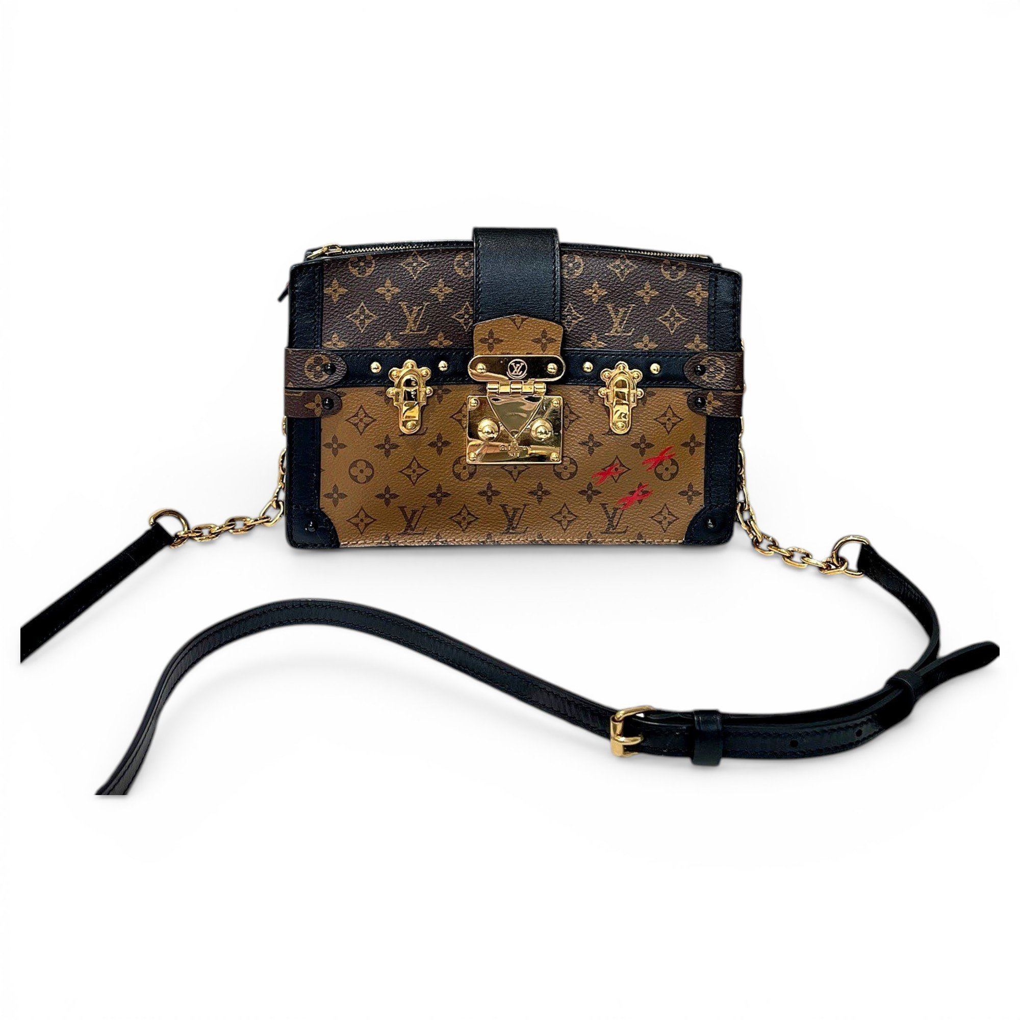 Pochette Trunk leather handbag