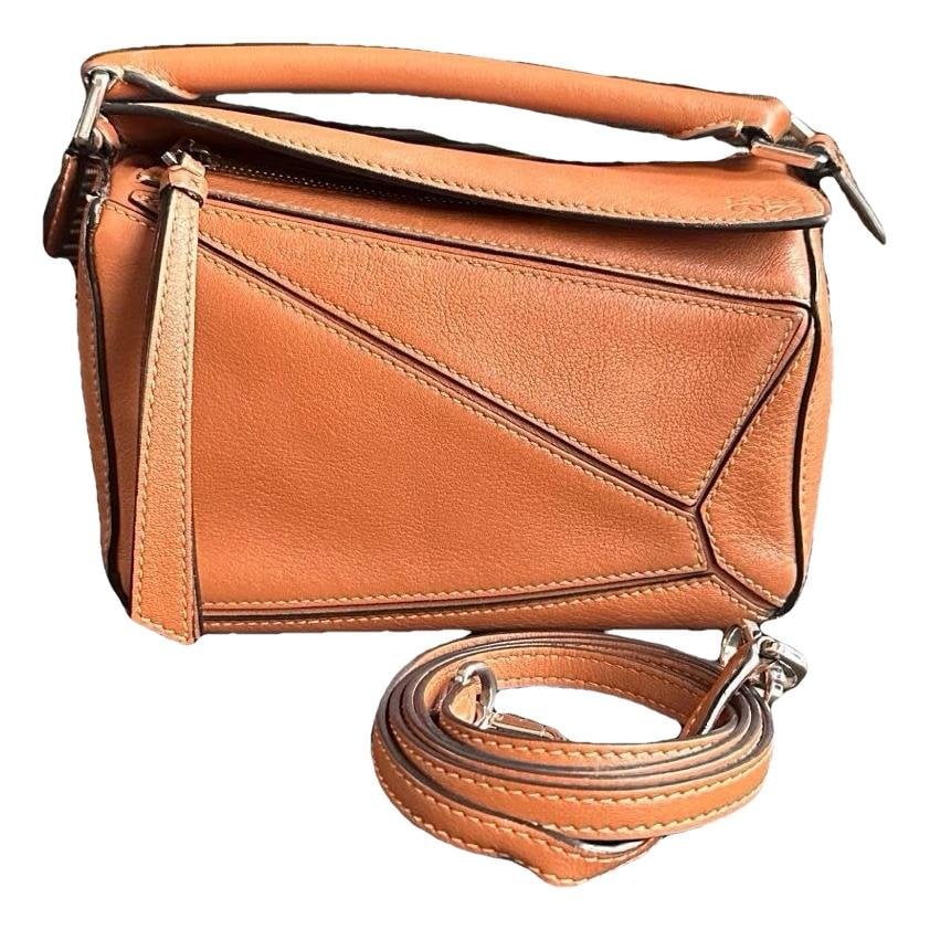 Puzzle leather handbag
