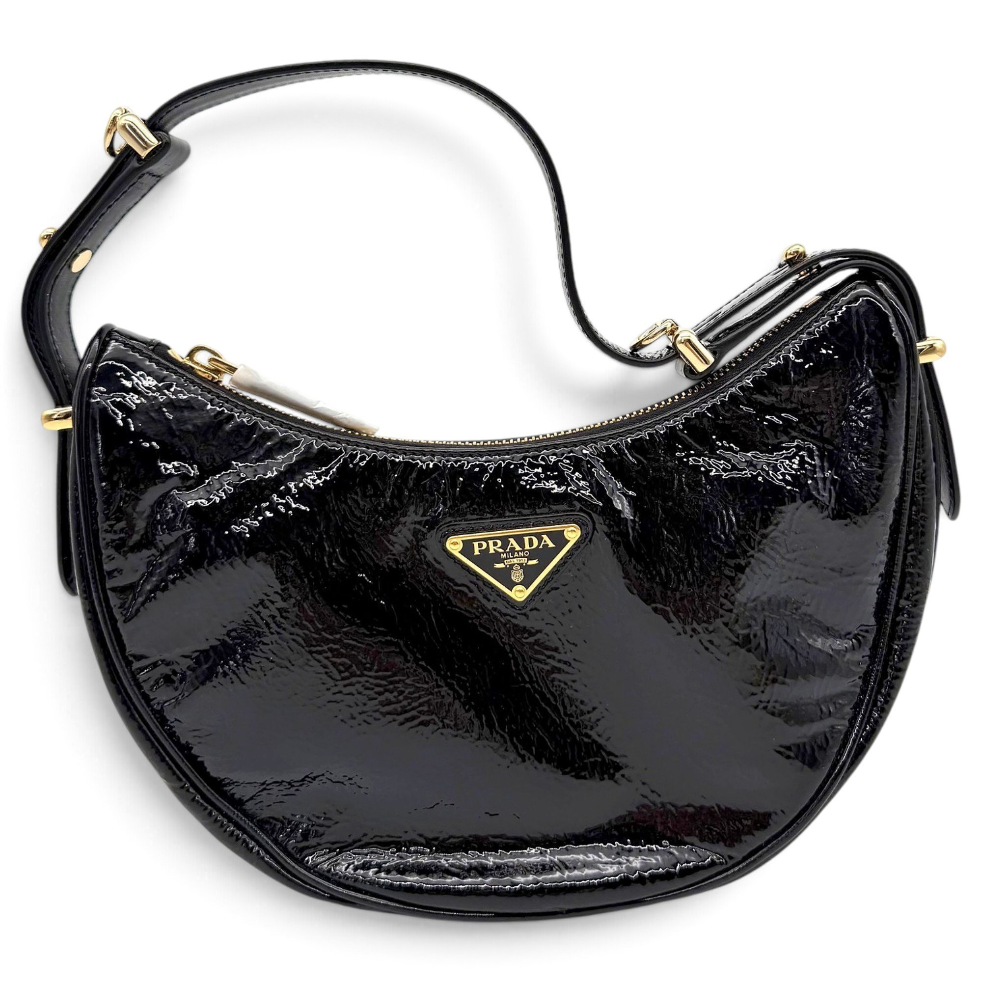 Arqué patent leather handbag