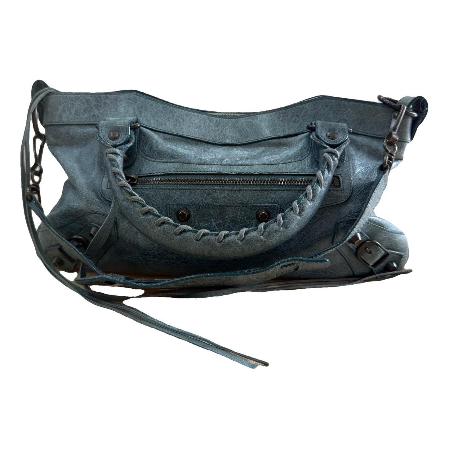 First leather handbag