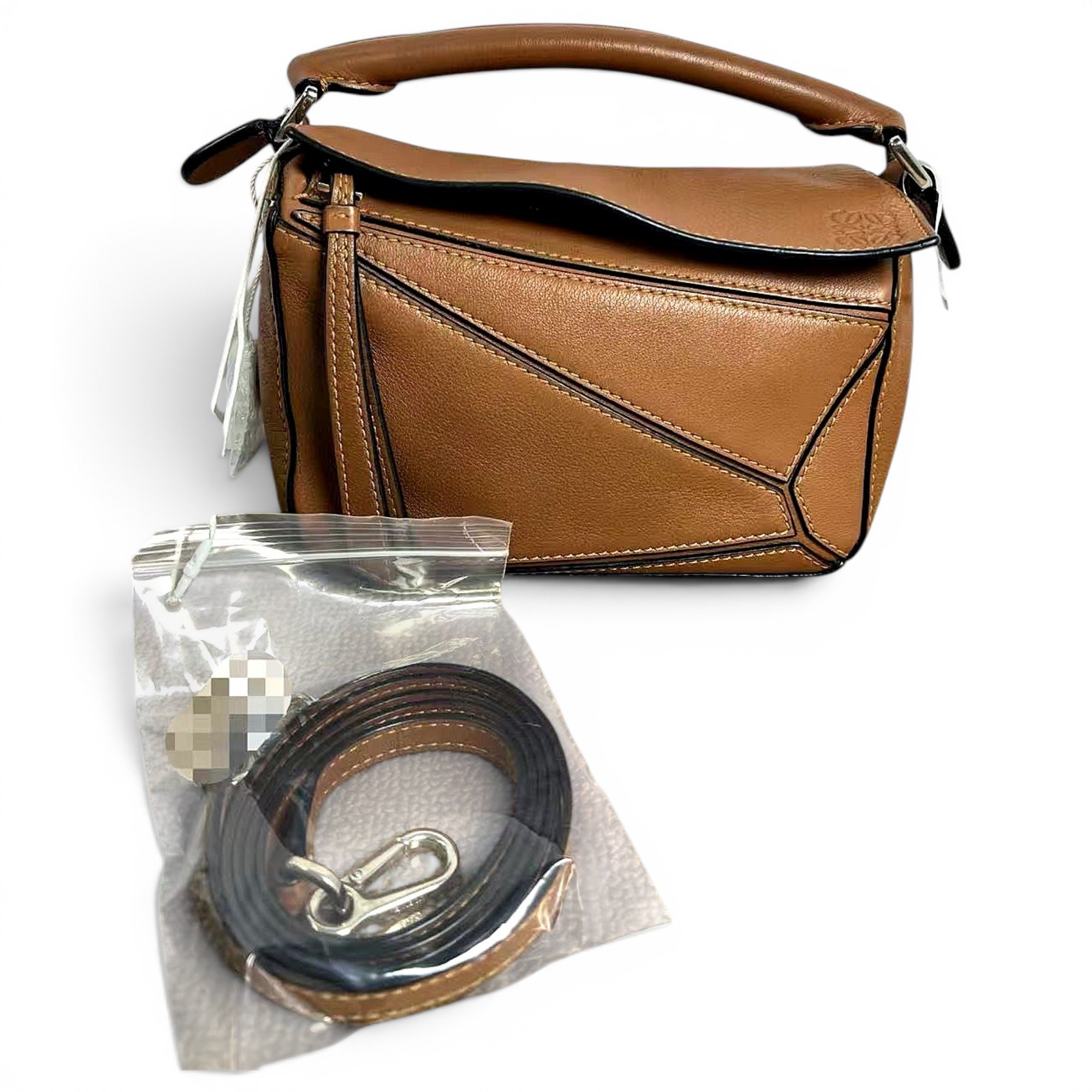Puzzle leather handbag