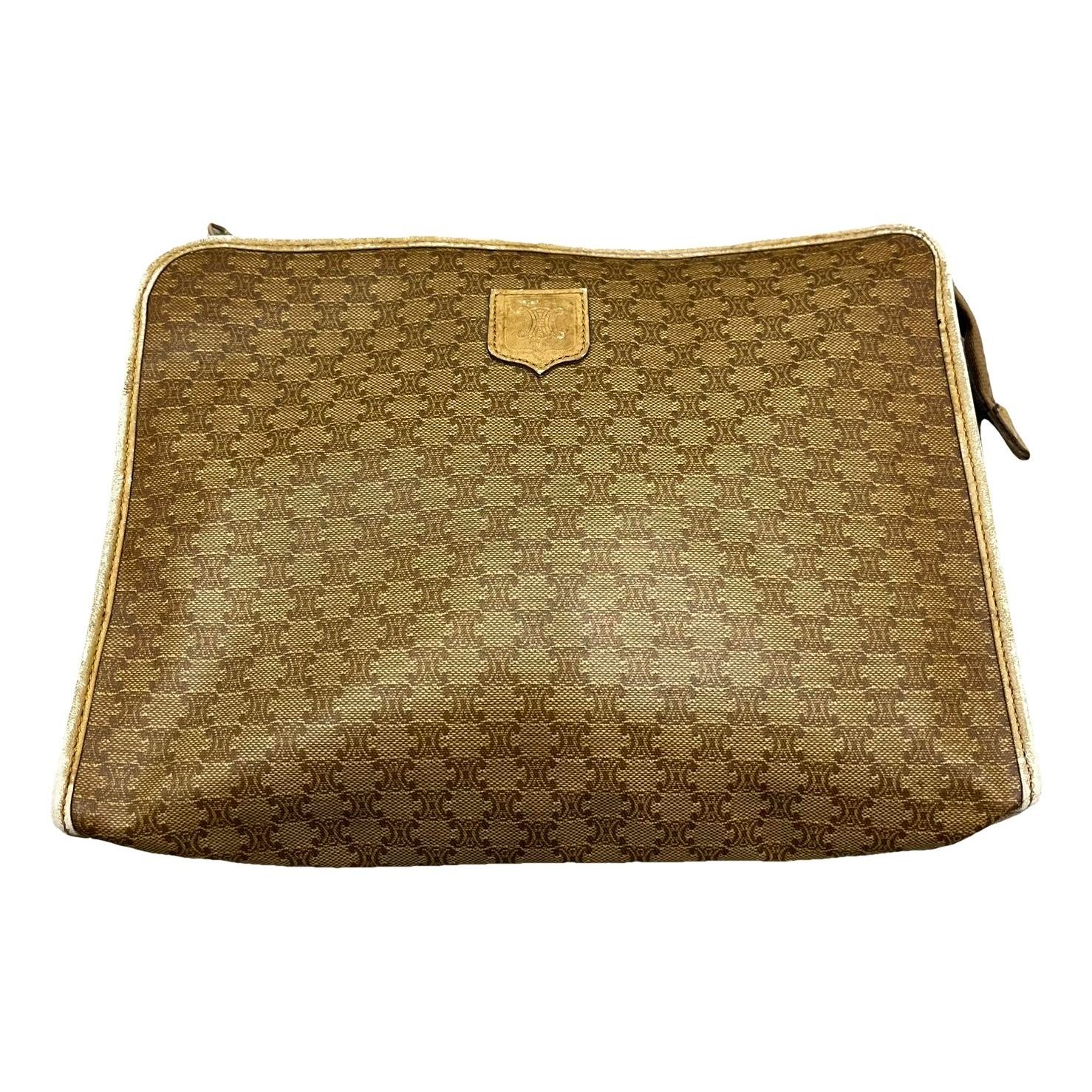 Triomphe Vintage cloth clutch bag