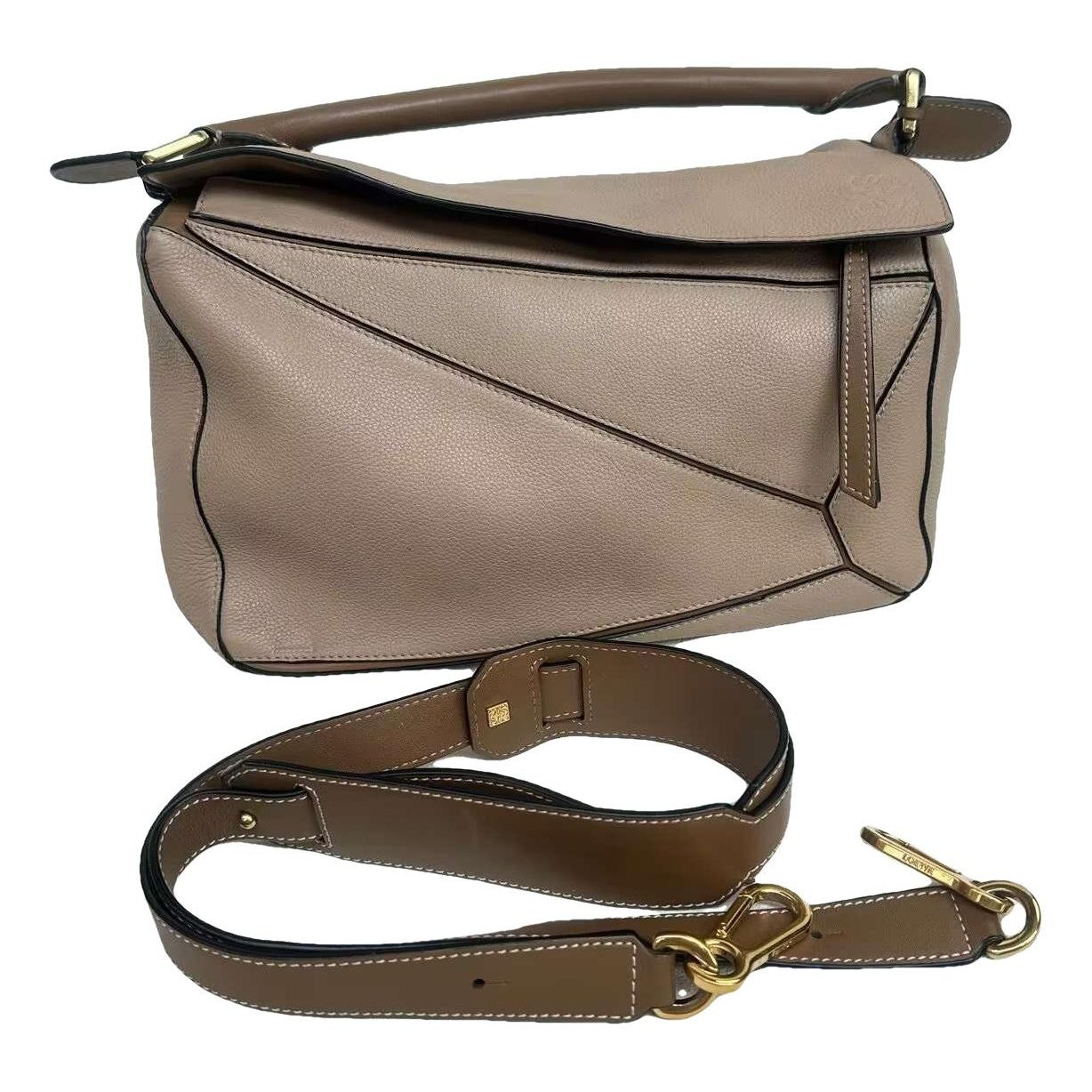 Puzzle leather handbag