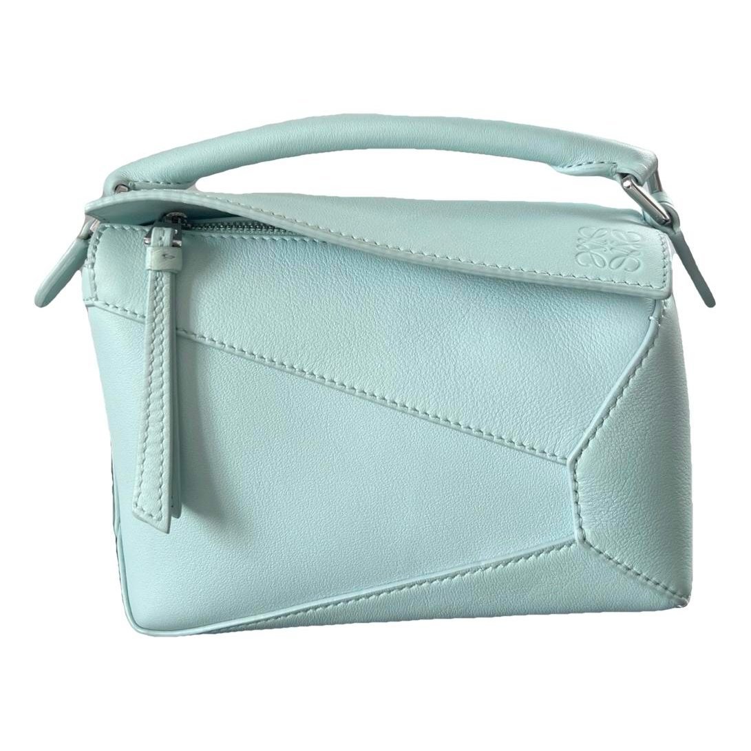 Puzzle leather handbag