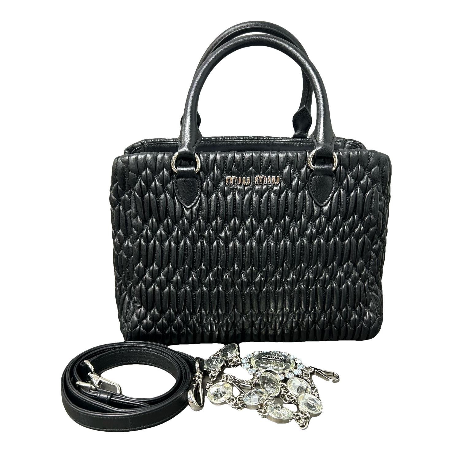 Miu Crystal leather handbag