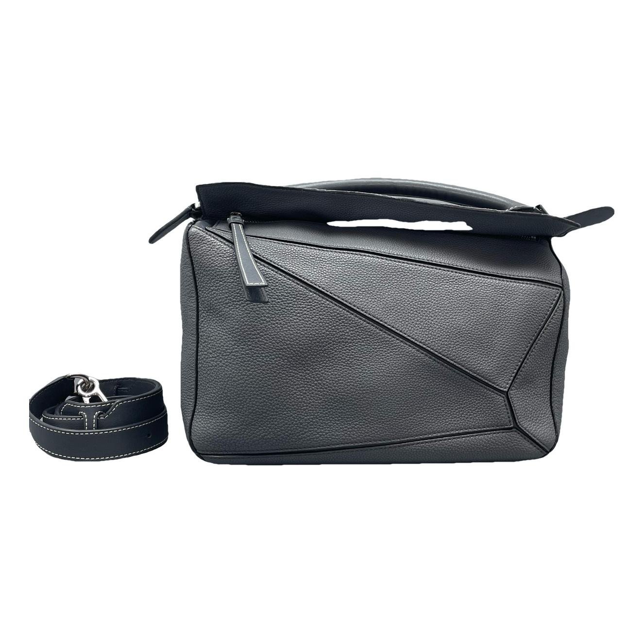 Puzzle leather handbag