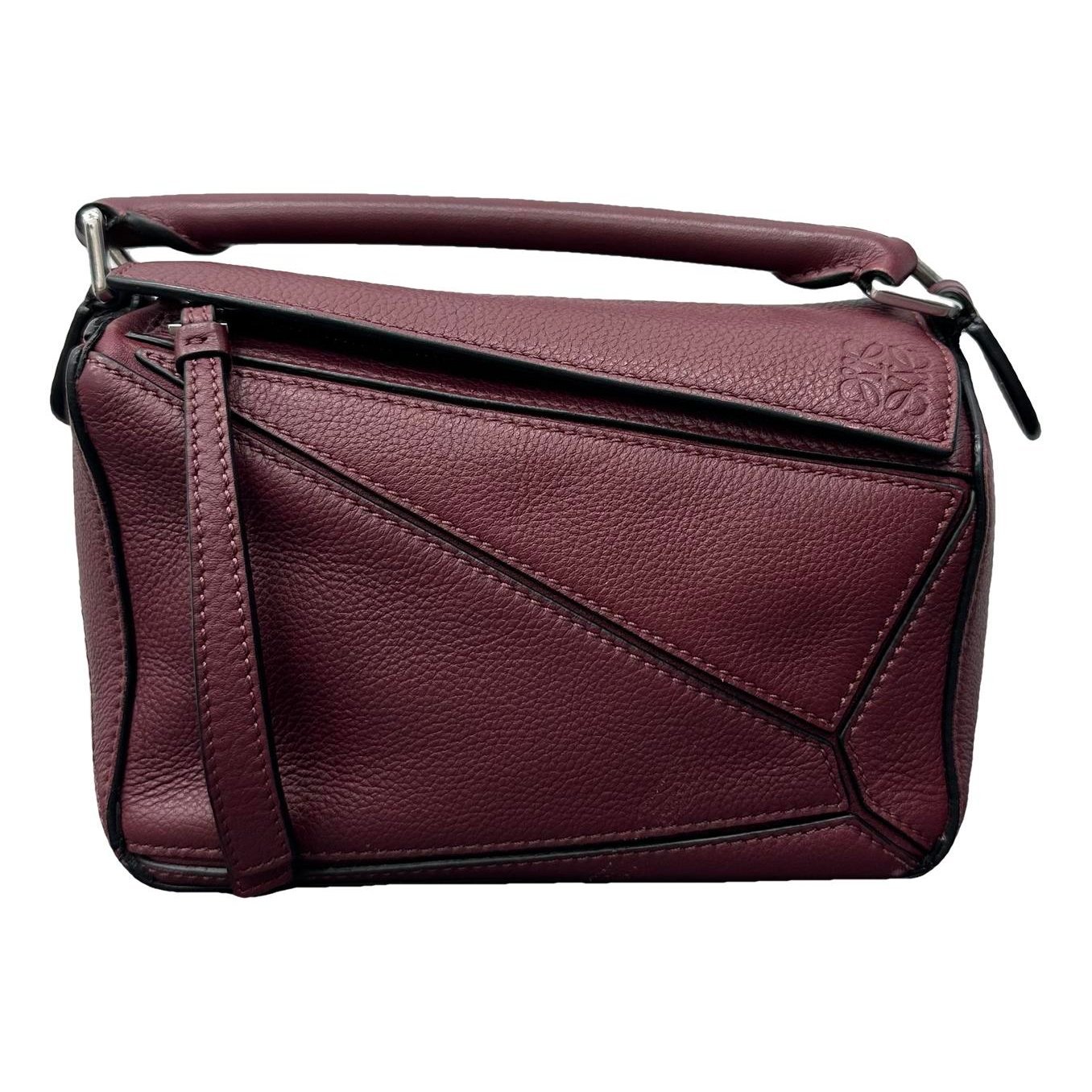 Puzzle leather handbag