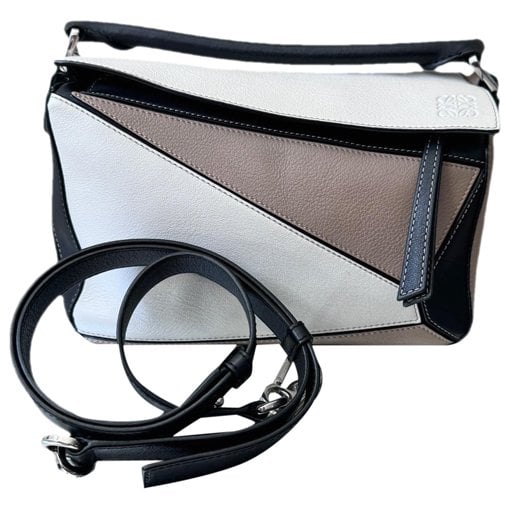 Puzzle leather handbag