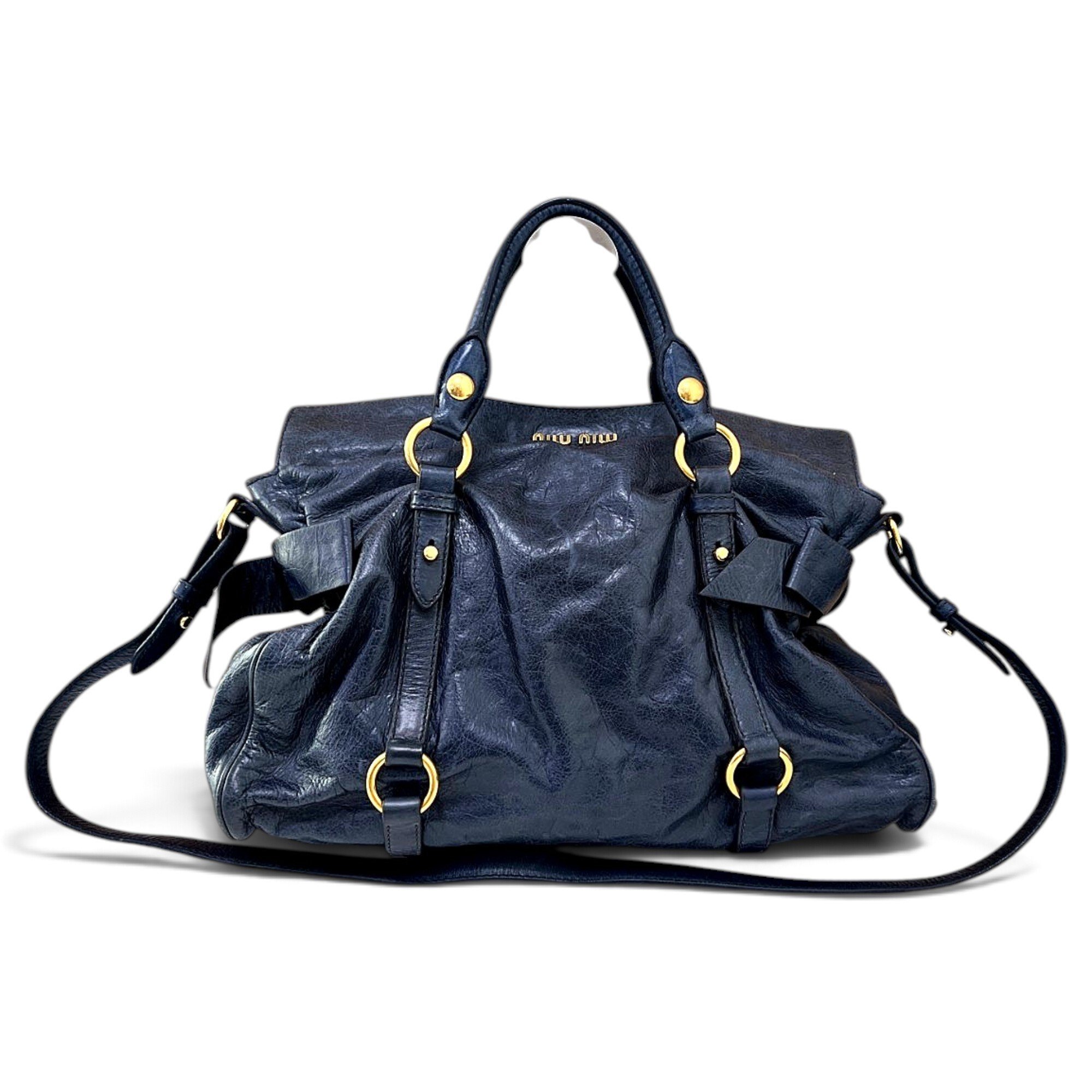 Bow bag leather handbag