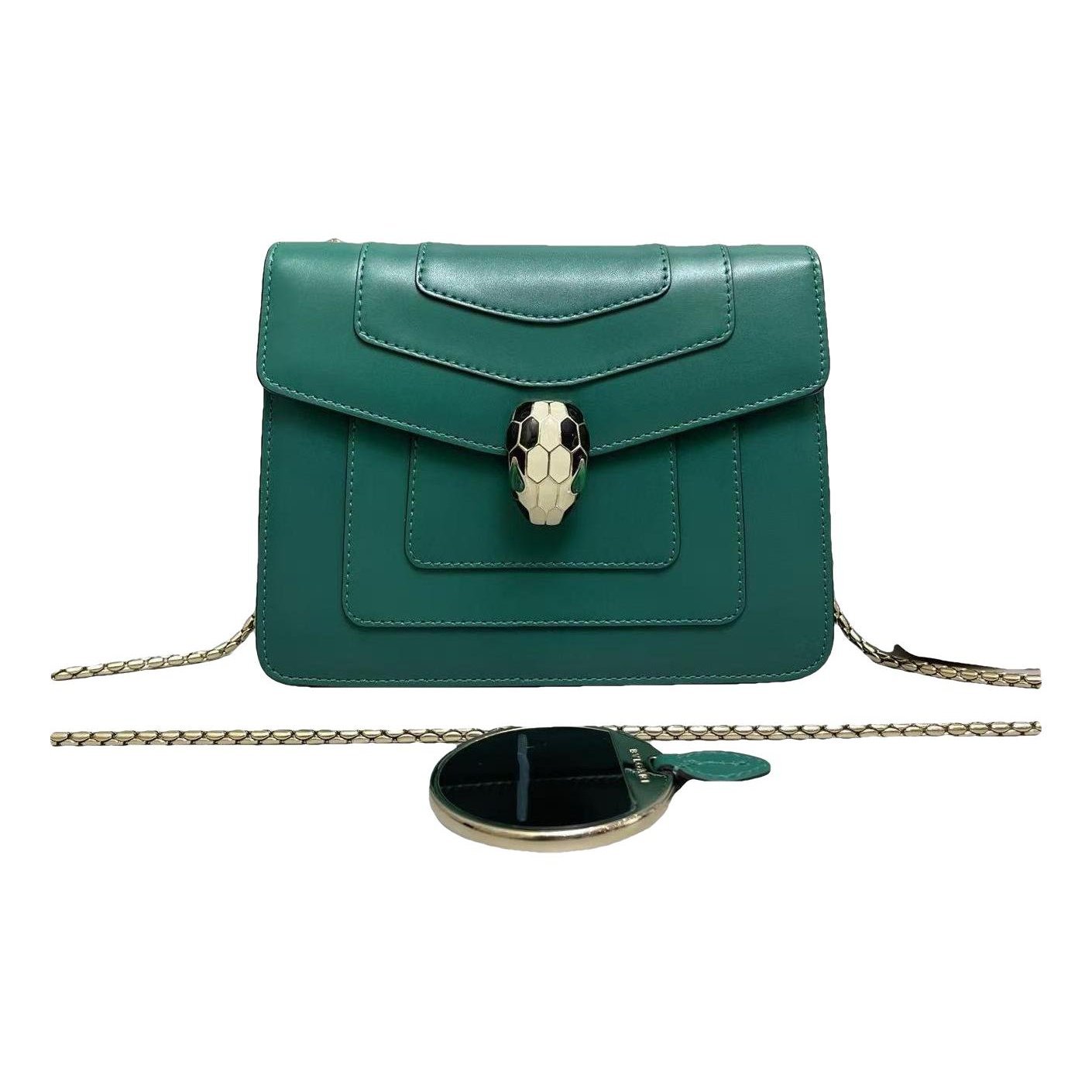 Serpenti leather handbag