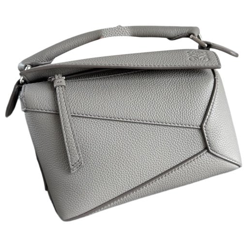 Puzzle leather handbag