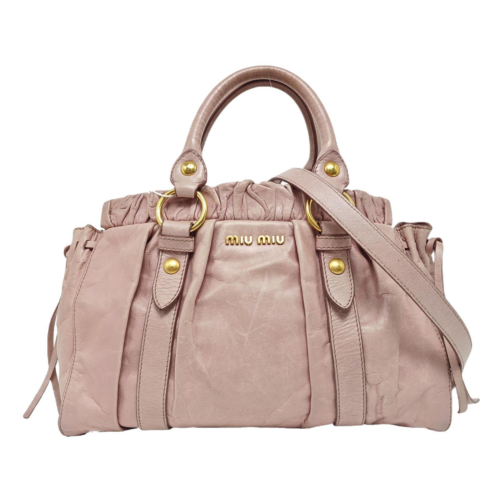 Bow bag leather handbag