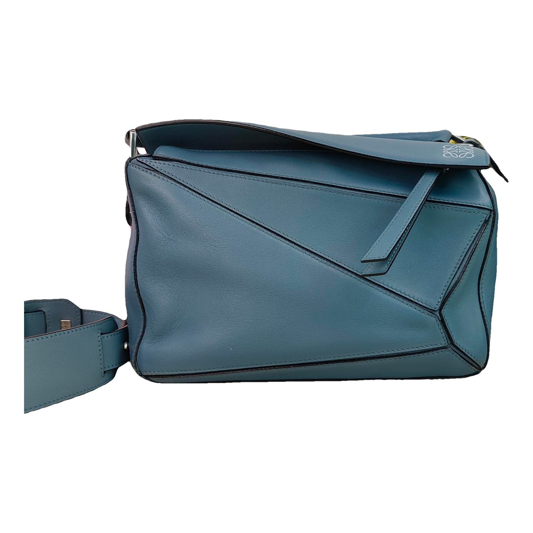 Puzzle leather handbag