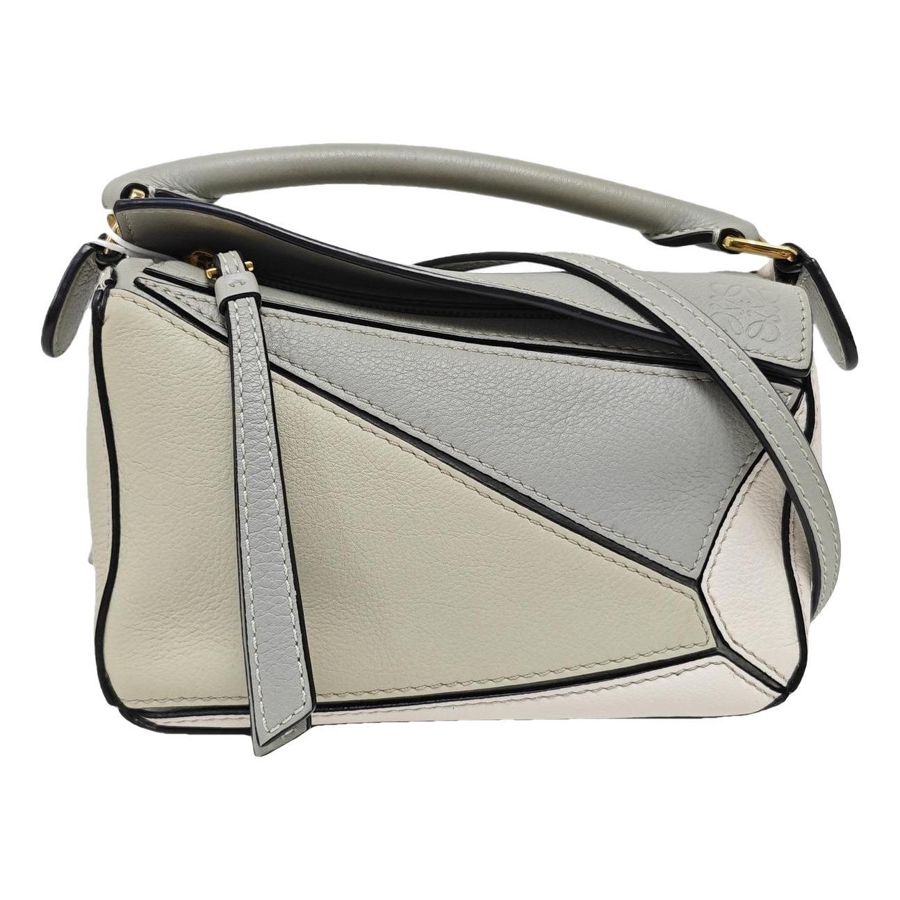 Puzzle leather handbag