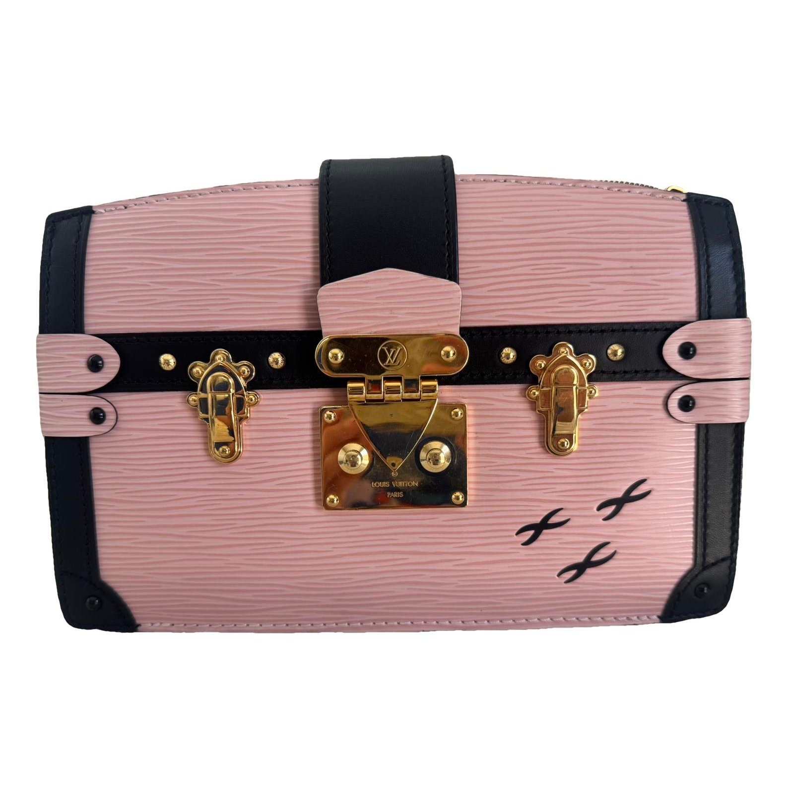 Pochette Trunk leather handbag
