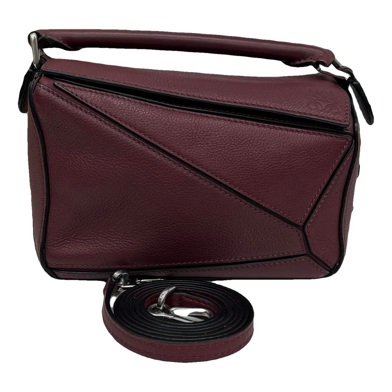 Puzzle leather handbag