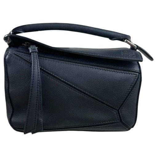 Puzzle leather handbag