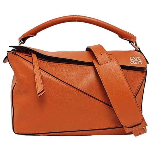 Puzzle leather handbag