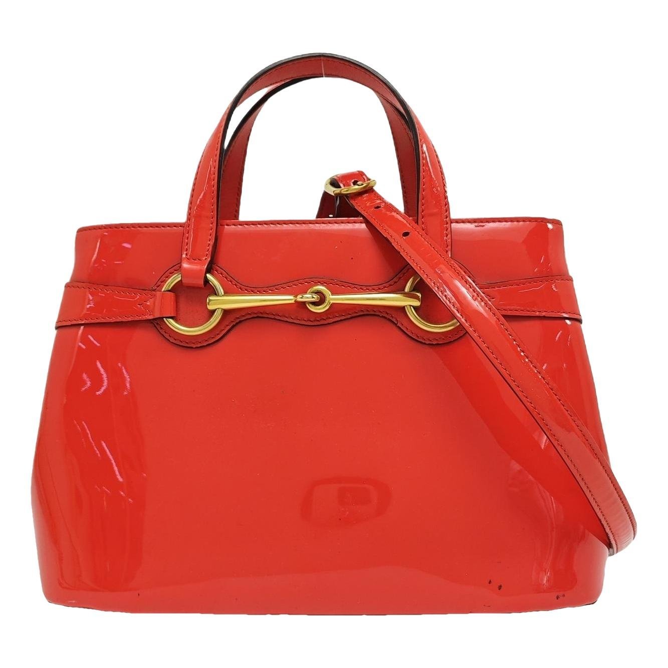 Bright Bit patent leather handbag