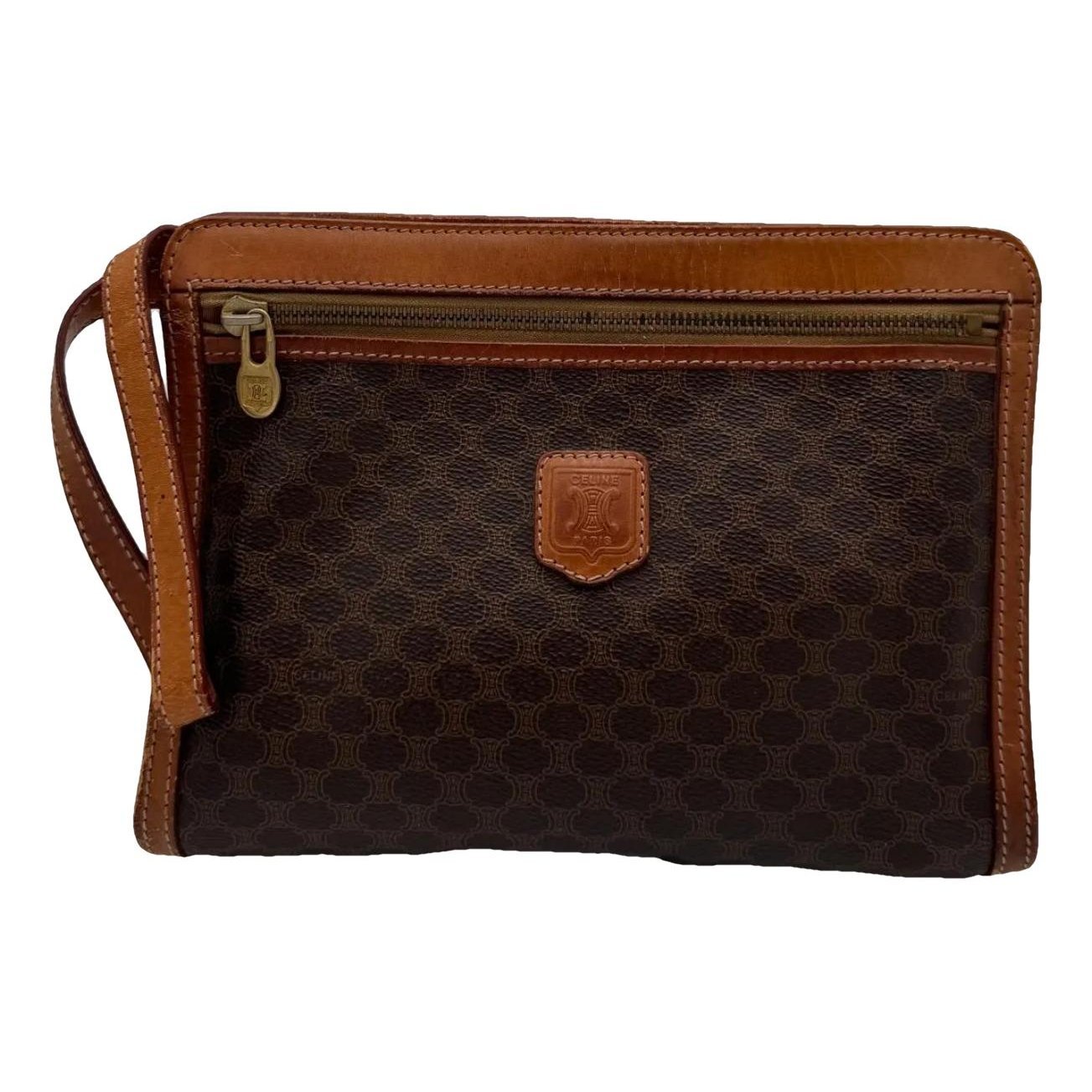 Triomphe Vintage leather clutch bag