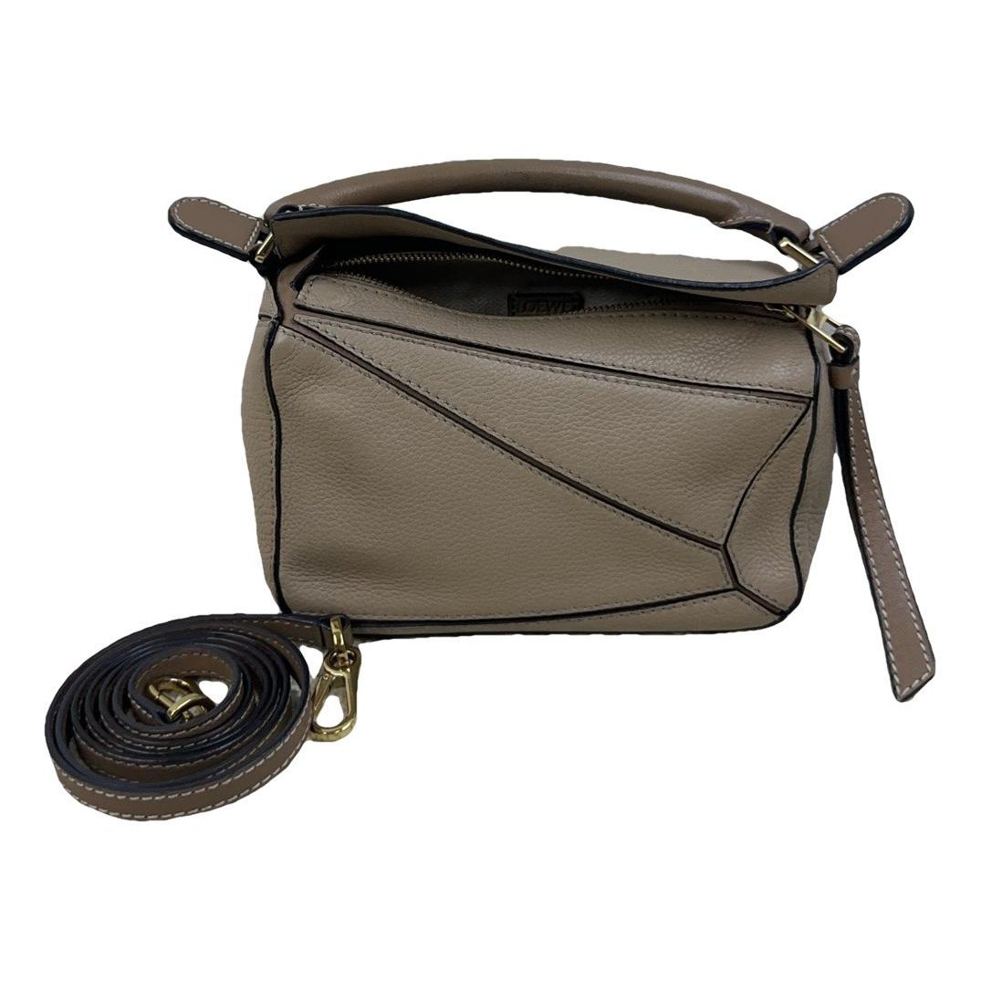 Puzzle leather handbag