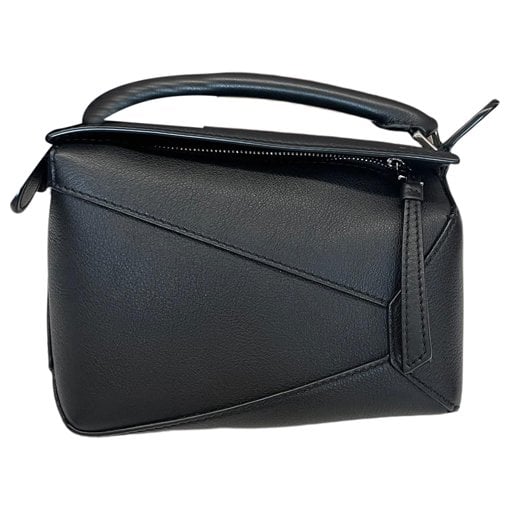 Puzzle leather handbag
