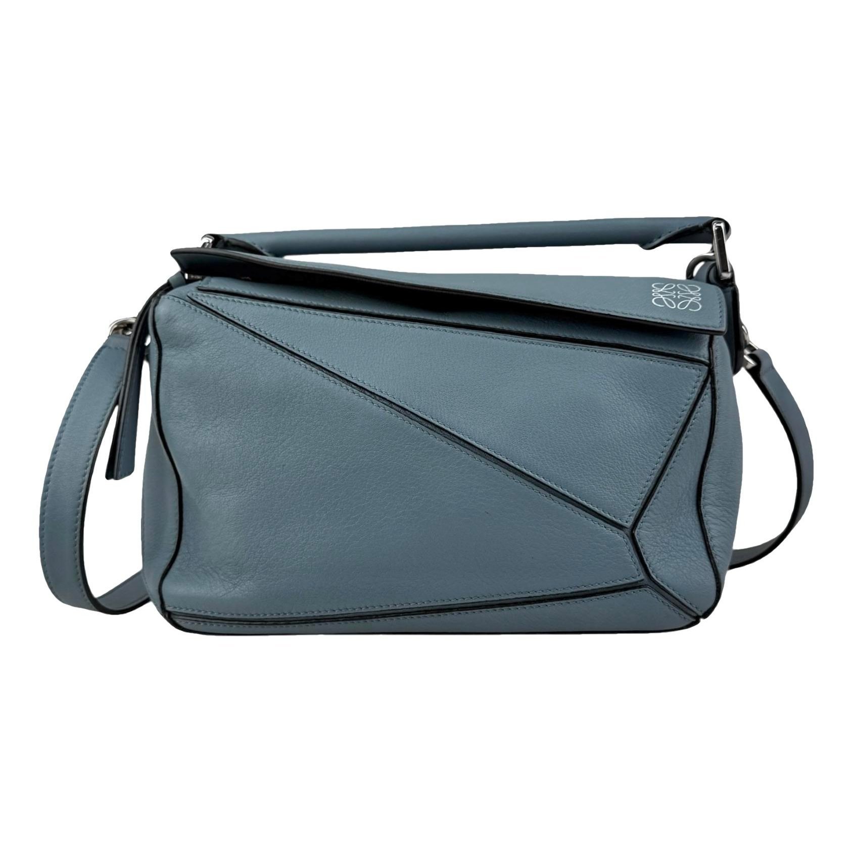Puzzle leather handbag
