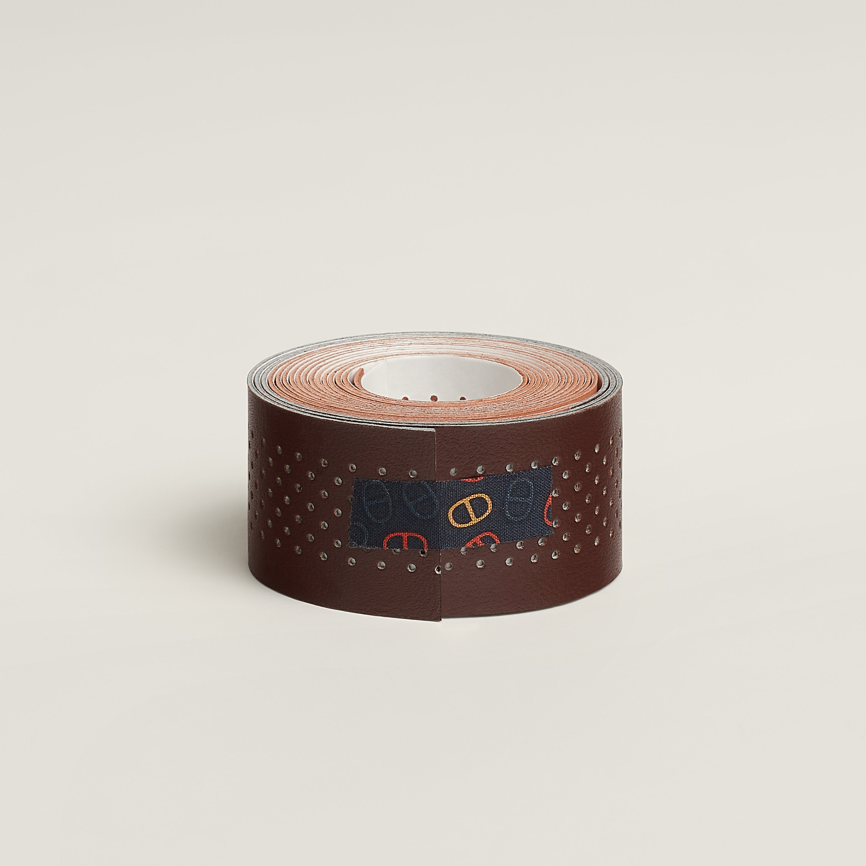 Perforated adhesive tape