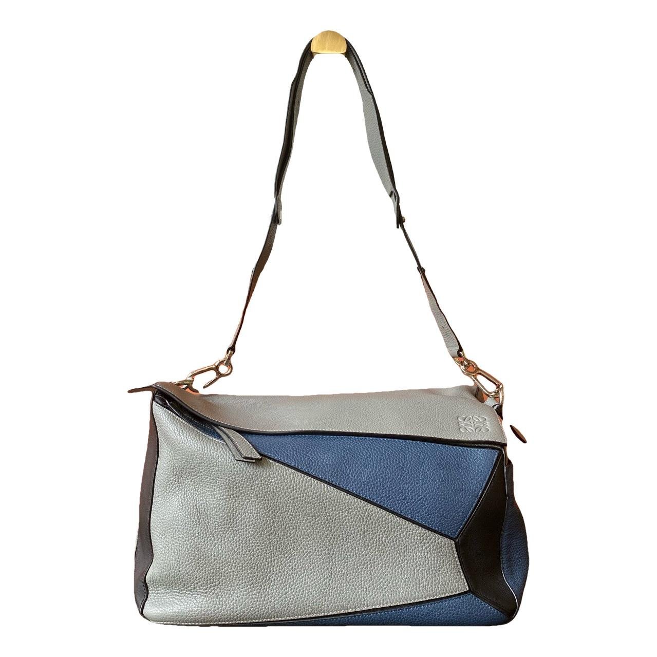 Puzzle leather handbag