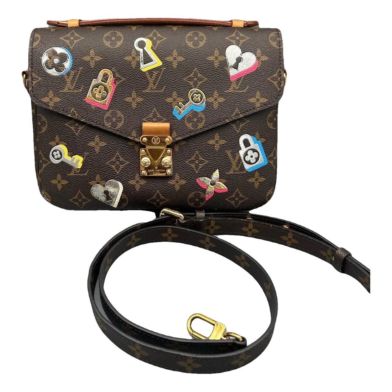 Metis vinyl crossbody bag
