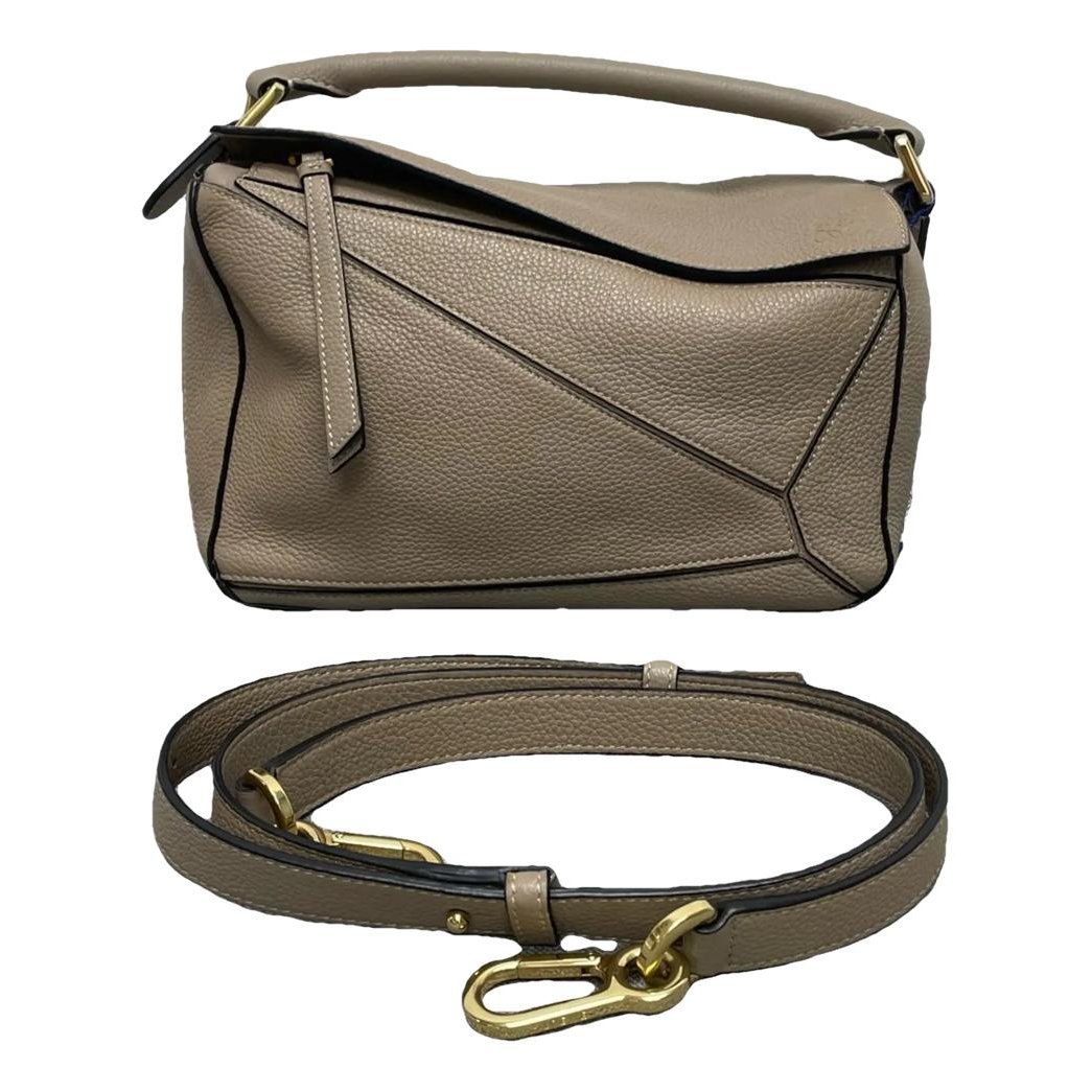 Puzzle leather handbag