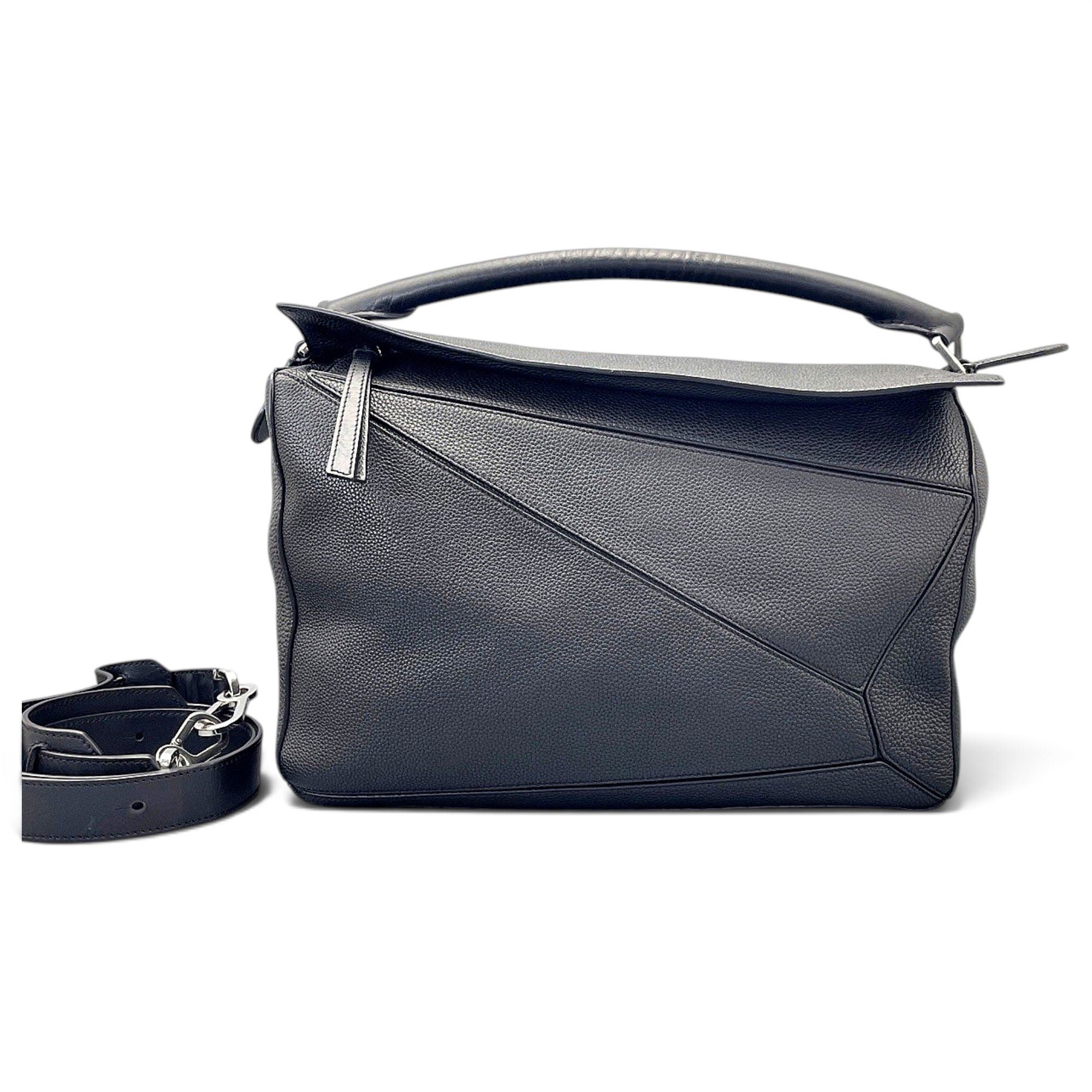 Puzzle leather handbag