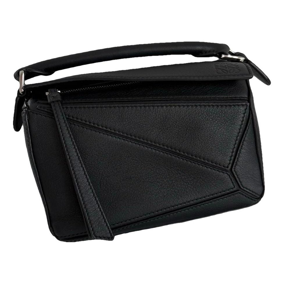 Puzzle leather handbag