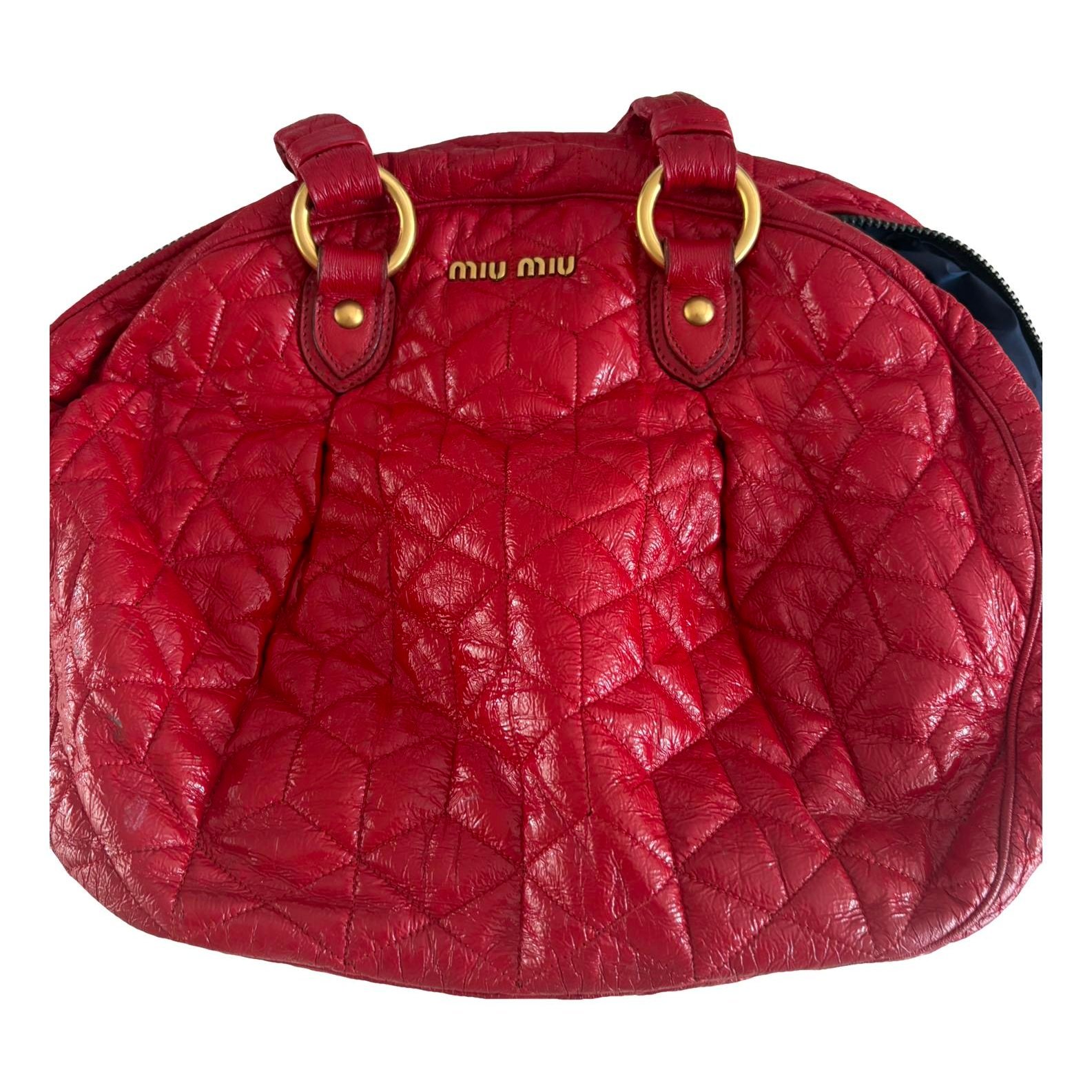 Matelassé patent leather tote