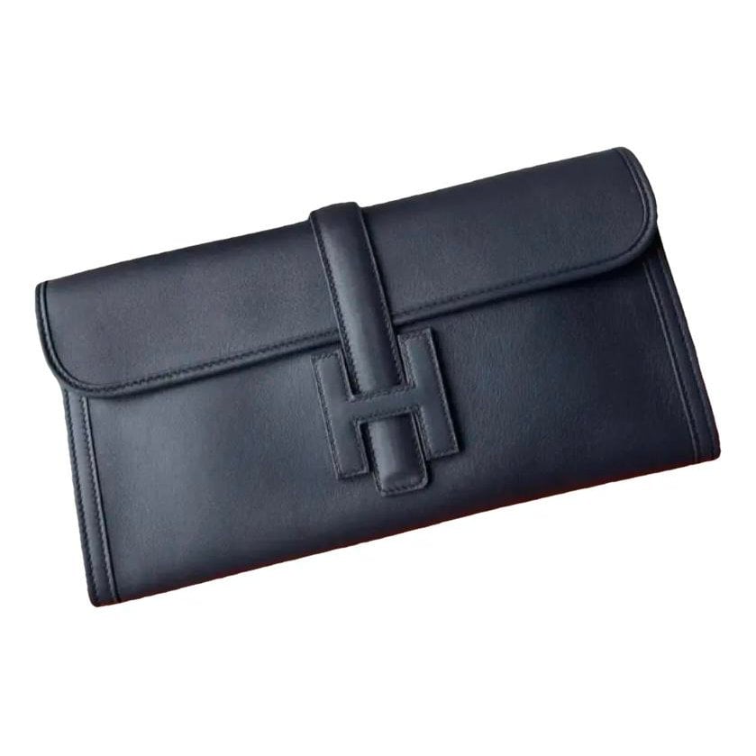 Jige leather clutch bag