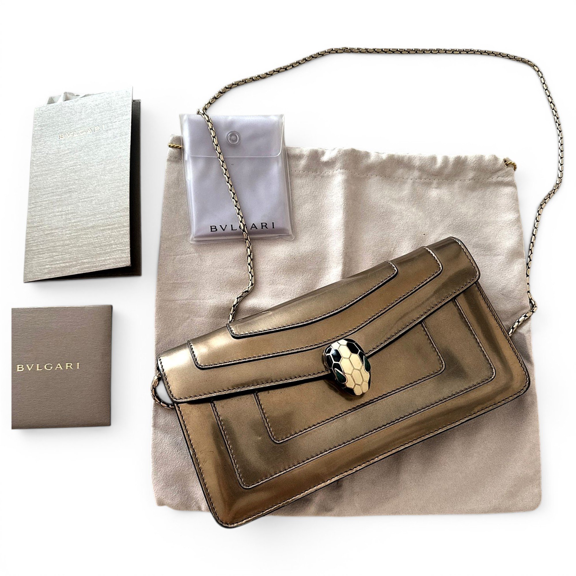 Serpenti patent leather clutch bag