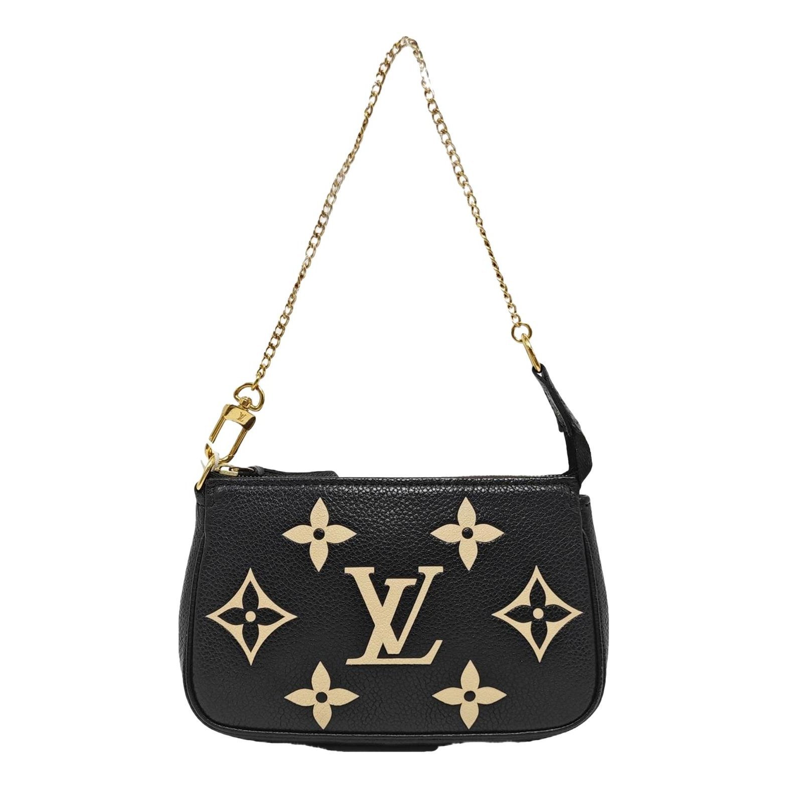 Maxi Multi Pochette Accessoires leather handbag