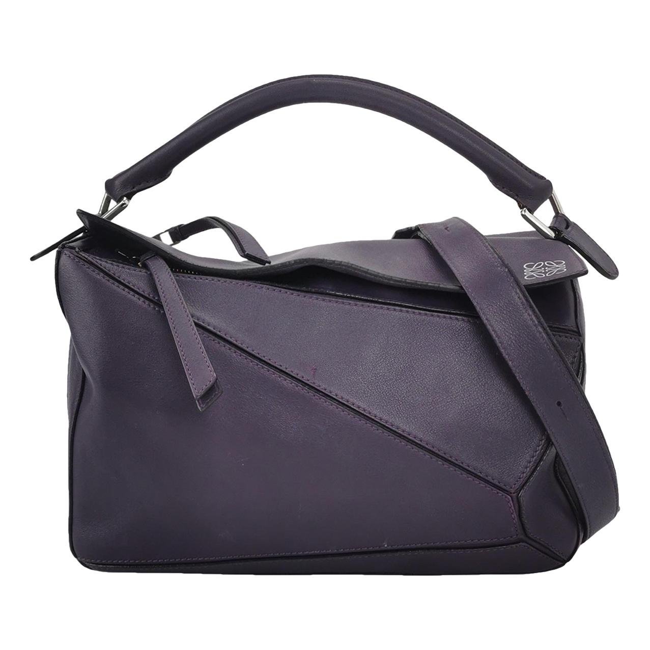 Puzzle leather handbag
