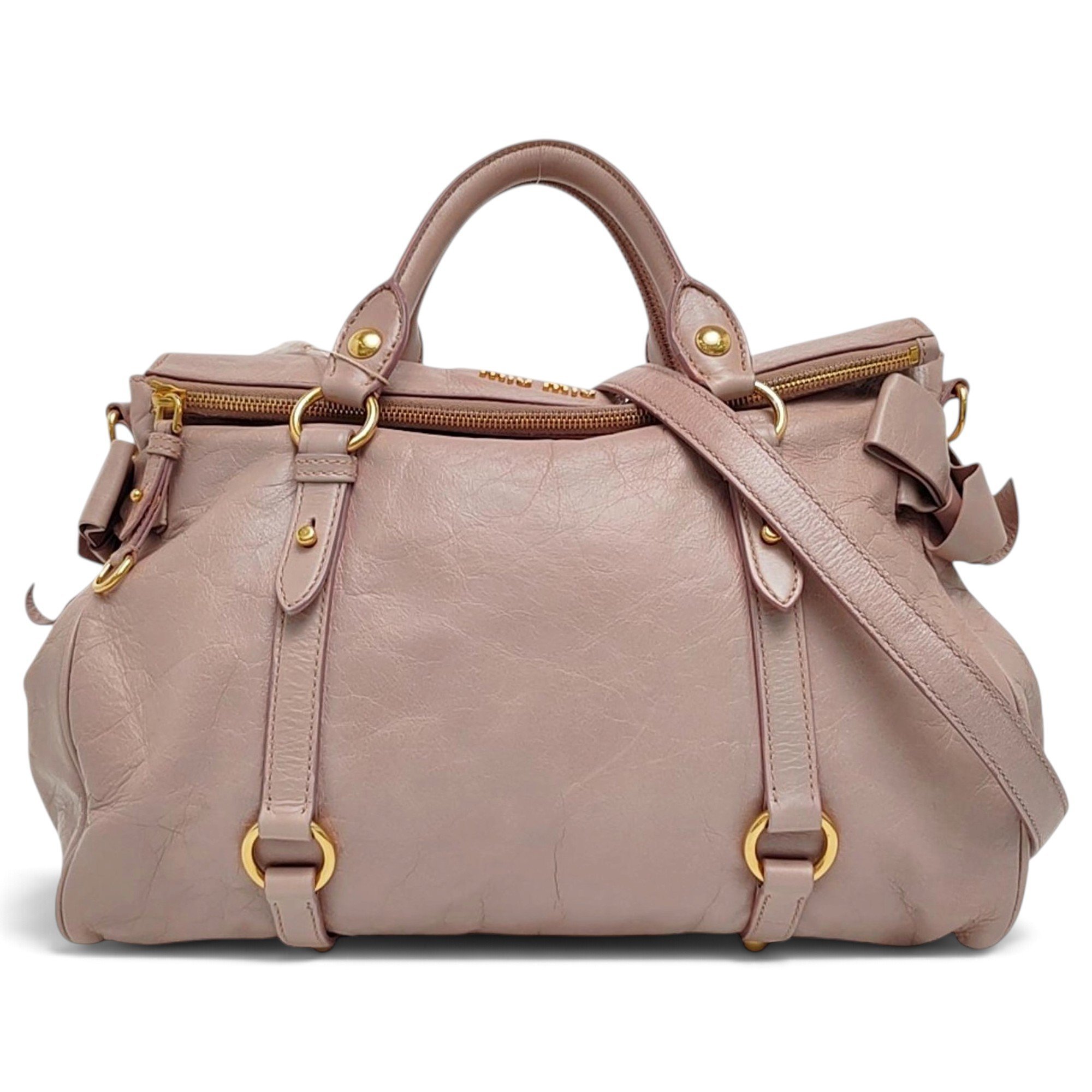 Bow bag leather handbag