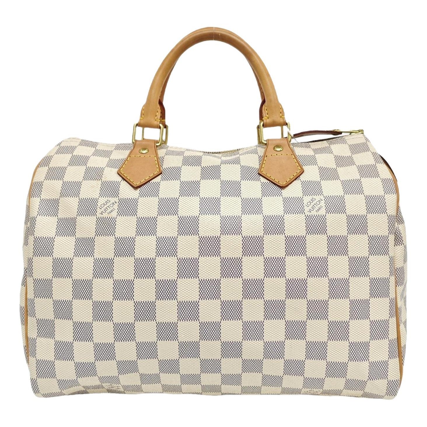 Nano Speedy / Mini HL leather handbag