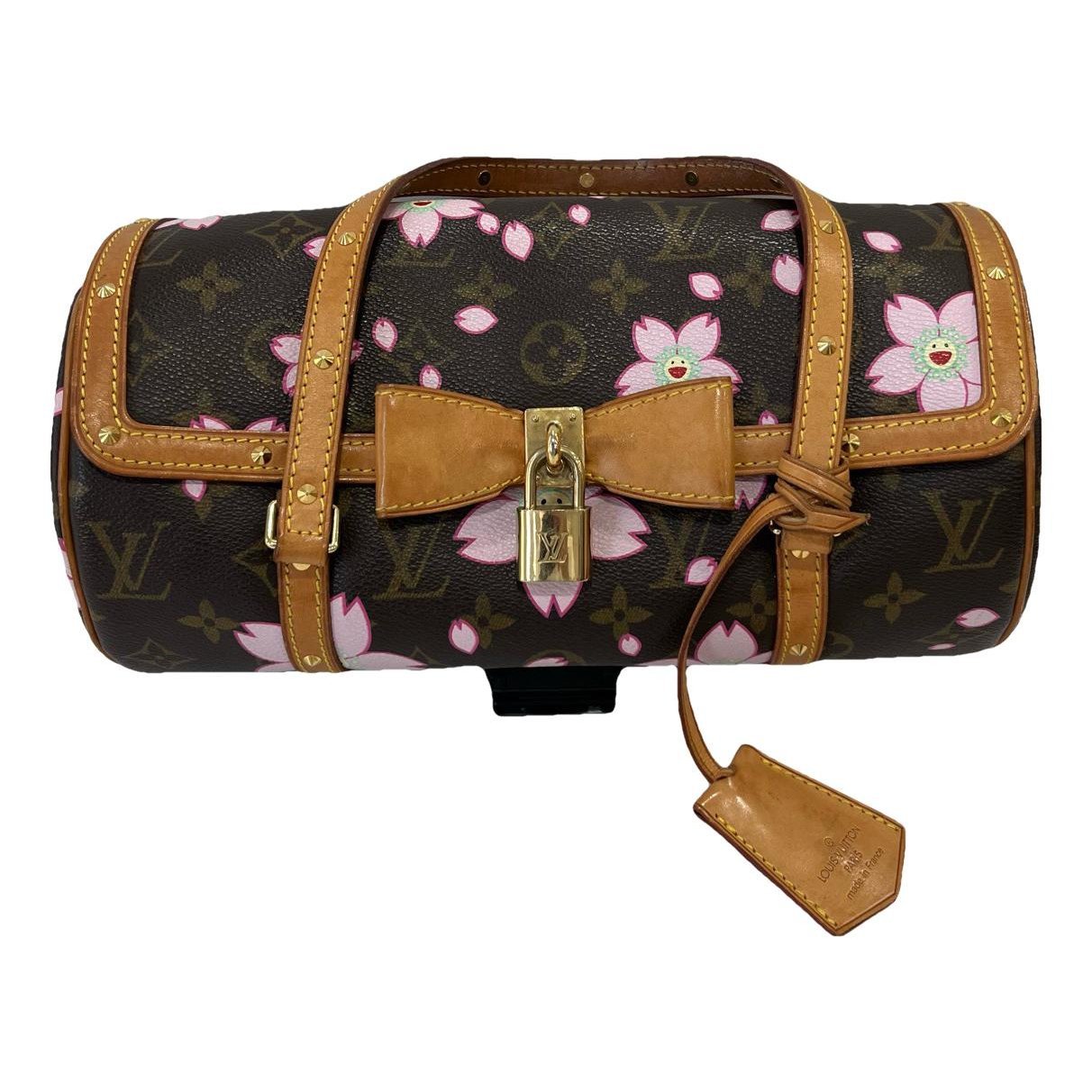 Papillon vinyl handbag